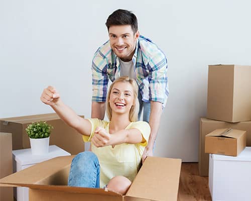 Happy couple having fun after getting homebuyer assistance in Florida